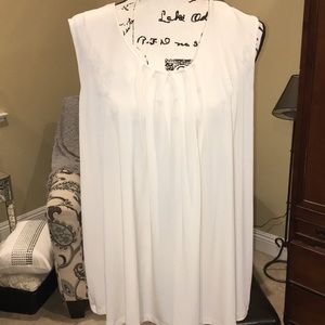 Cream colored shell blouse